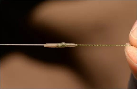 Immagine di Pole Position Knot Protector Sleeve, per carpfishing venduto da Carpela